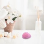 Heart-shaped silicone face wash brush for effective skincare.