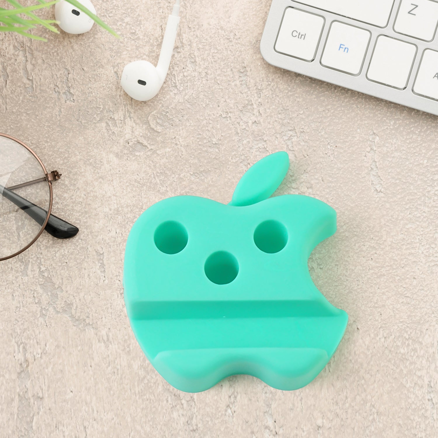 Bright apple-shaped desk organizer with phone holder and pen storage