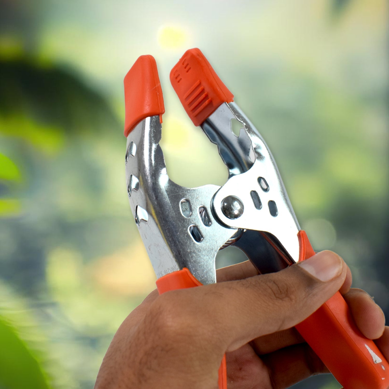 Multi-angle view of the GripMax heavy duty metal spring clamp.