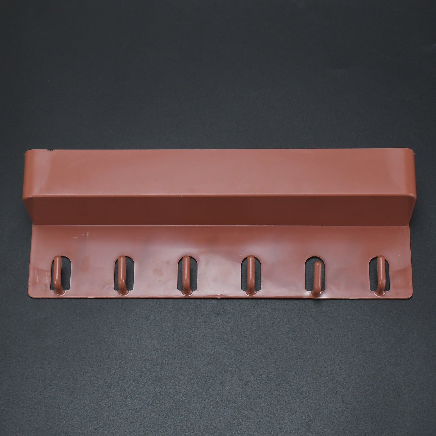 Angled view of the multi-use Key Holder Stand displaying its sleek design and ample space for organization.