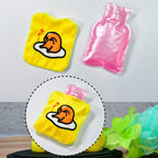 Soft fabric-covered yellow duck hot water bag, perfect for cozy relaxation.