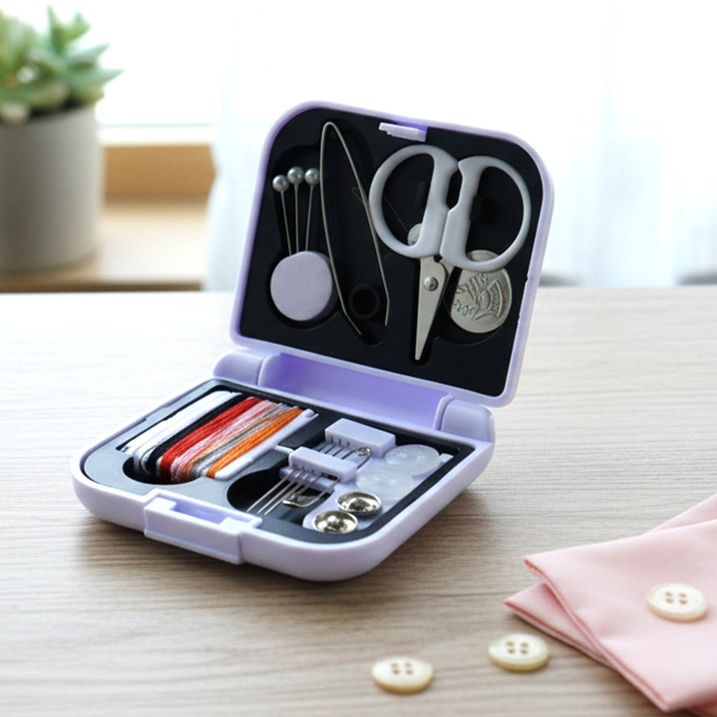 Angle view showing threads and needles inside compact portable sewing kit