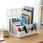 Front compartments of desk organizer for holding pens and stationery supplies.