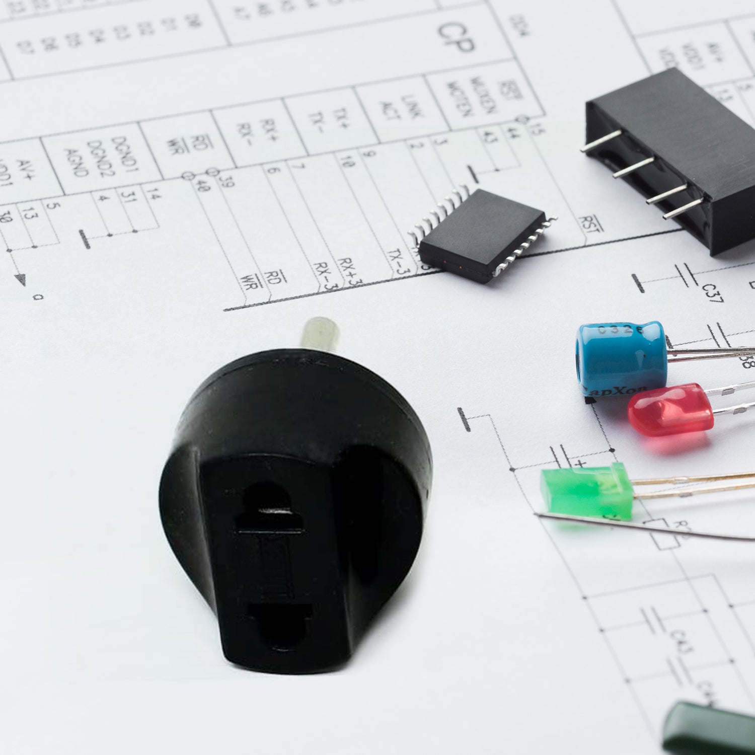 The  2 Pin Plug Adapter displayed with its retail color box packaging.
