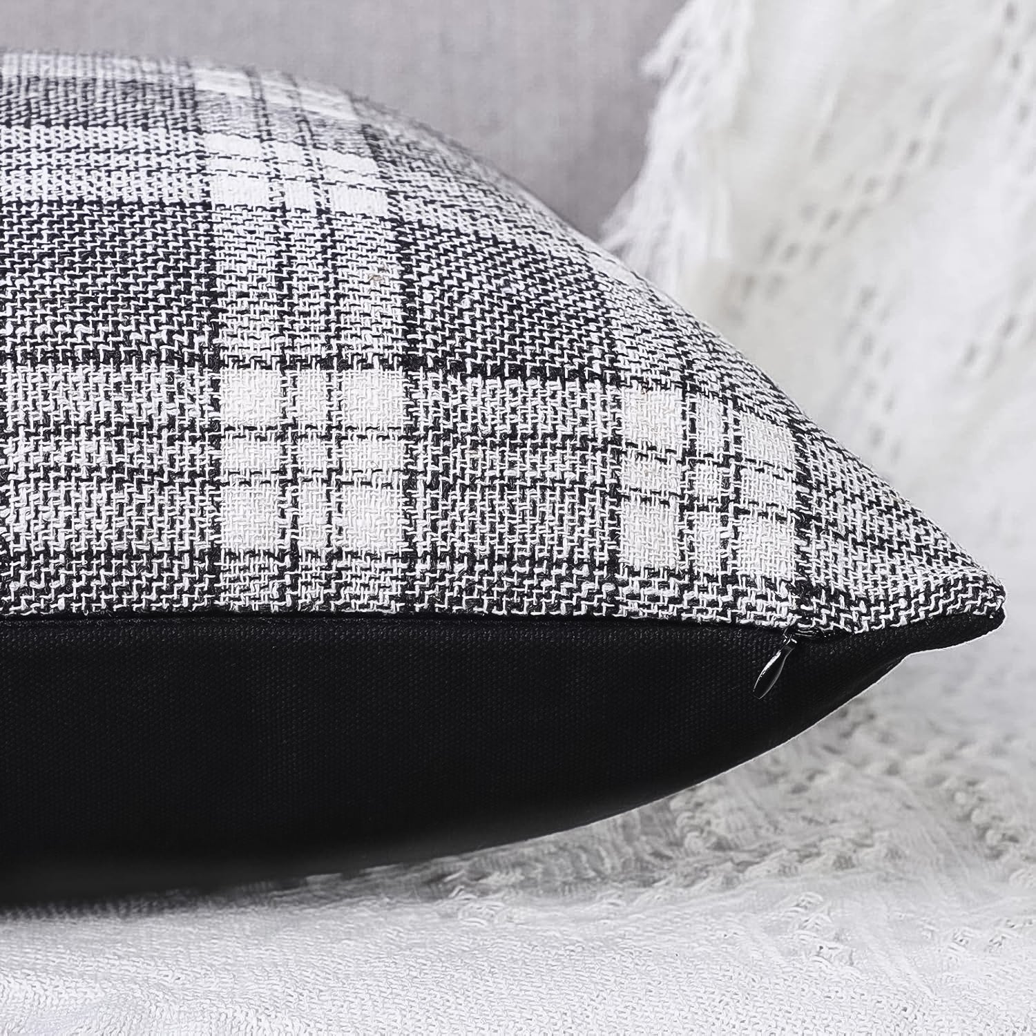 Detail shot of the soft faux leather side of a decorative cushion case.