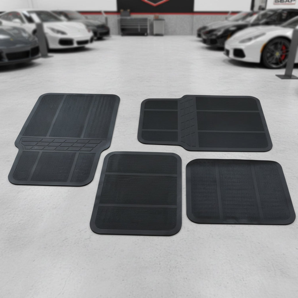 Universal vehicle floor protection mats in black rubber