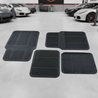 Universal vehicle floor protection mats in black rubber