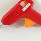 Detail view of the hot melt glue gun's safe, precision nozzle.