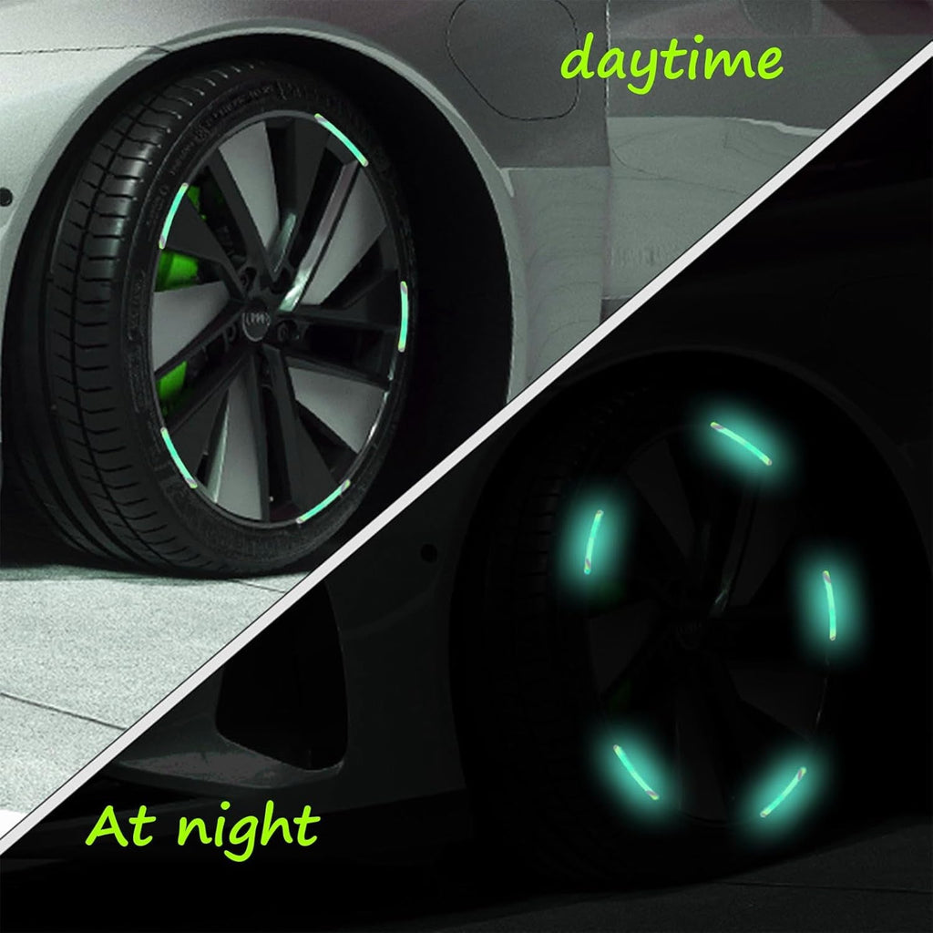 A car's wheel hub decorated with bright multicolored reflective stickers during the day.