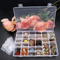 Clear plastic organizer box with 36 adjustable grids for versatile storage.