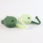 Sticky adhesive base of self adhesive round wall hooks showing strong adhesive pad