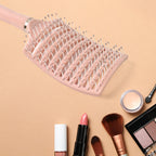 Close-up of ergonomic massage hair comb bristles with rounded tips