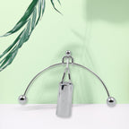 A stylish steel balance toy for desk decoration and stress relief.