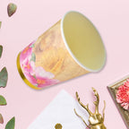 Variety of disposable paper cups in different patterns and colors, perfect for any event.