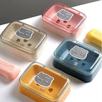Glossy finish of the plastic self-draining soap holder on a white background.