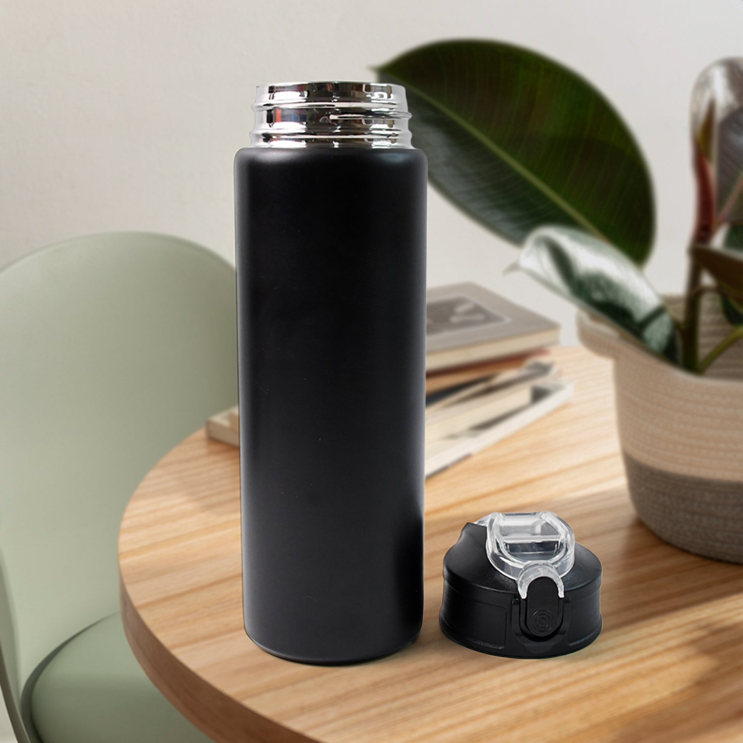 Close-up of matte black finish stainless steel sports water bottle
