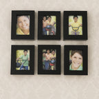Close-up of matte black frames in the 12-piece photo frame set