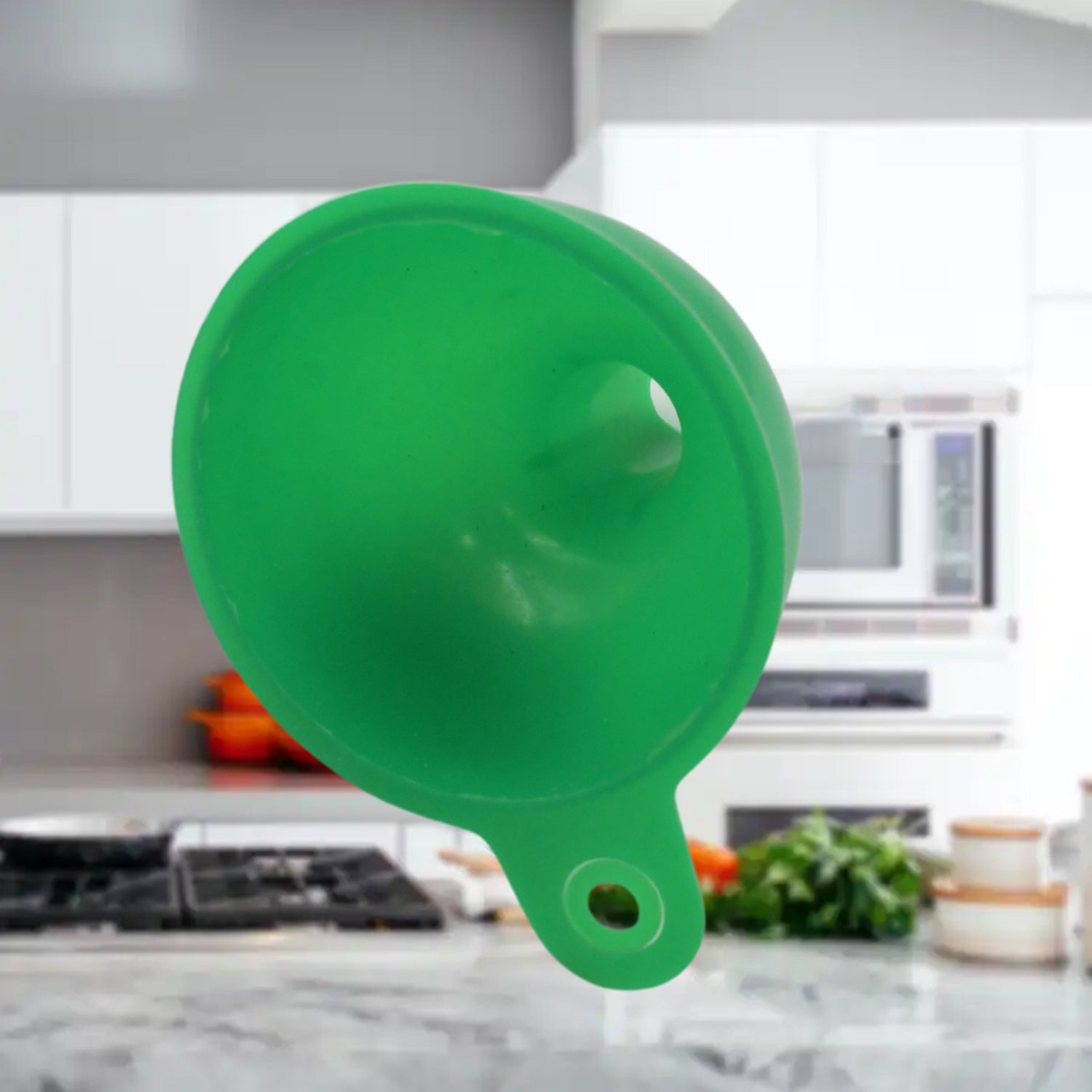 Durable green silicone funnel demonstrating its compact and flexible nature.
