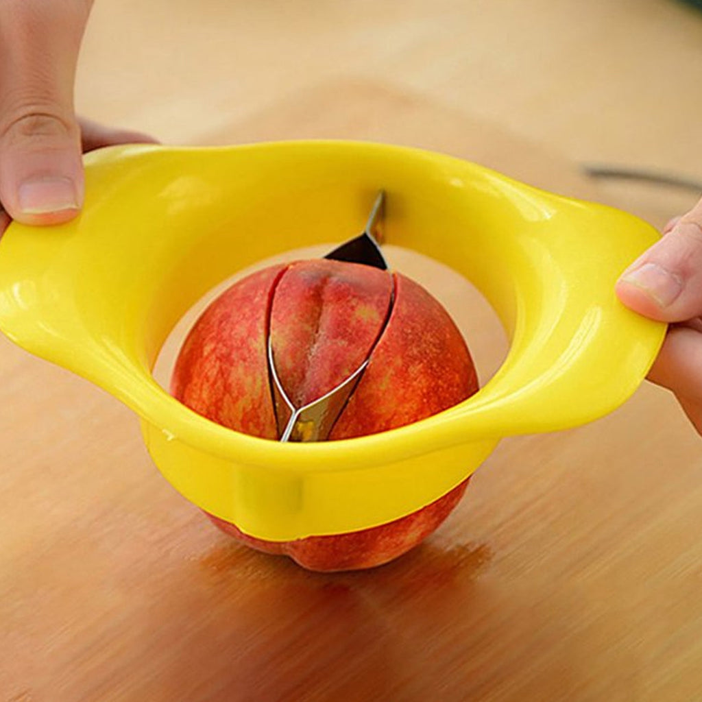 ChefAura mango cutter with a bright yellow mango, showcasing its ease of use.