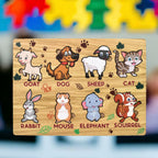 Child playing happily with the wooden animal puzzle on a playmat.