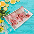 Plastic serving tray holding a cup and snack, ready for casual use.