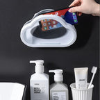 Close-up of the strong adhesive backing on the orange waterproof mobile stand before installation.