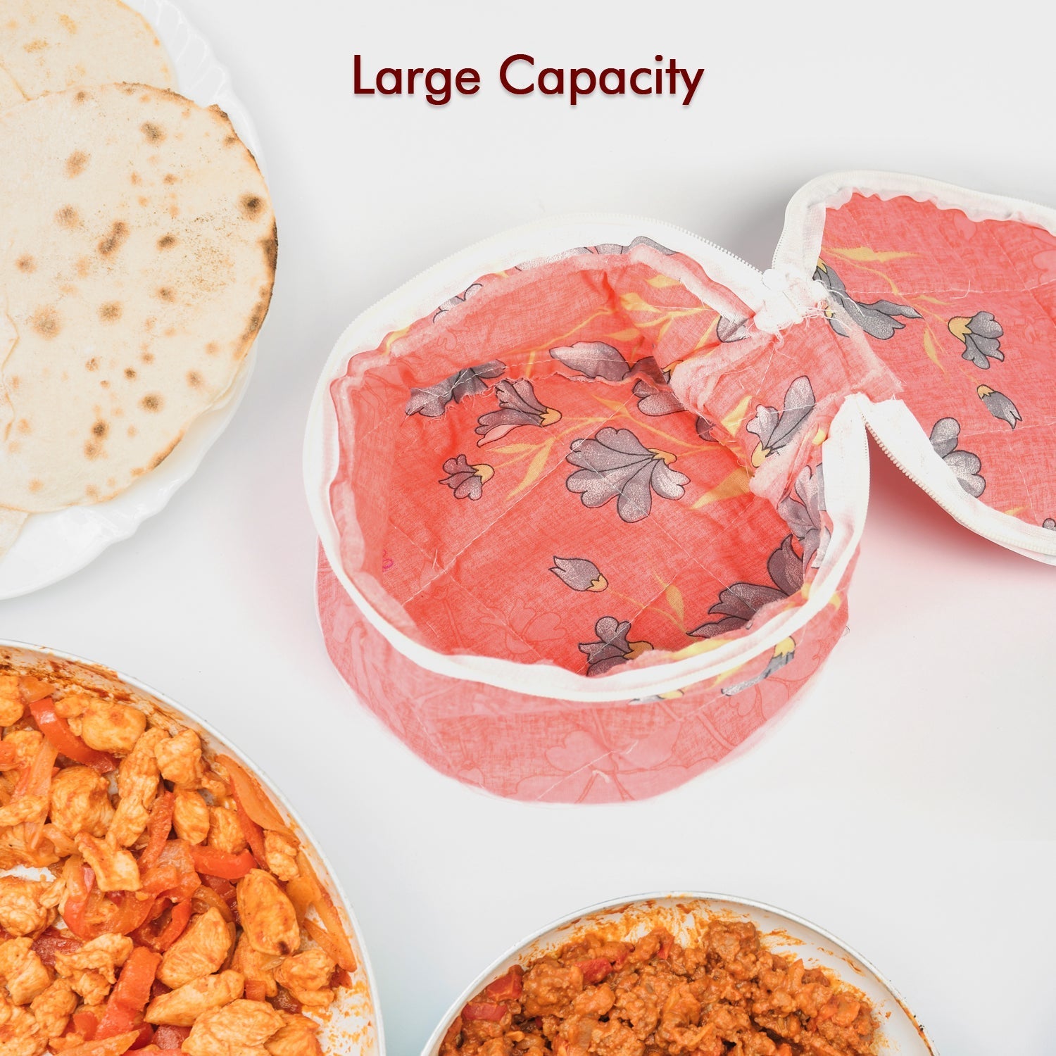 Fresh rotis neatly placed inside the chapatti box with accompanying roti rumals.