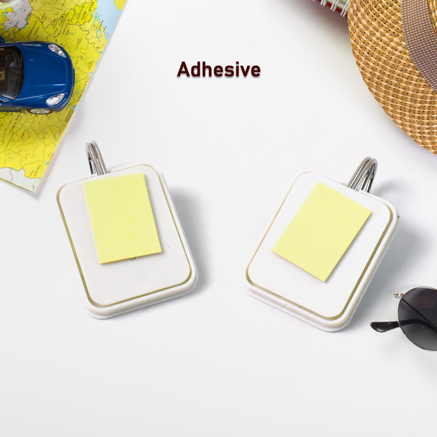 Set of self-adhesive cartoon hooks holding various household items