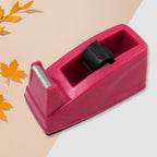 Ergonomic grip on plastic tape dispenser