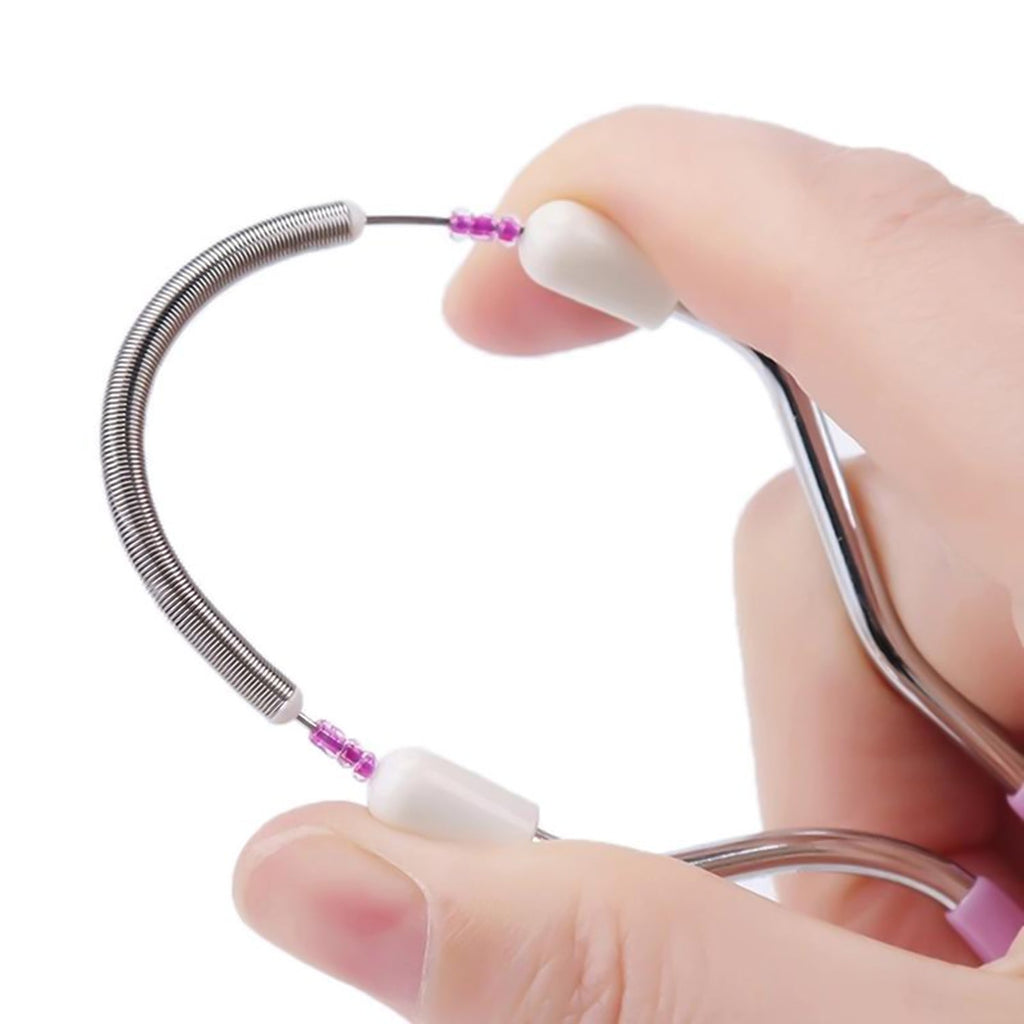 Facial hair remover spring tool from multiple angles highlighting durable material