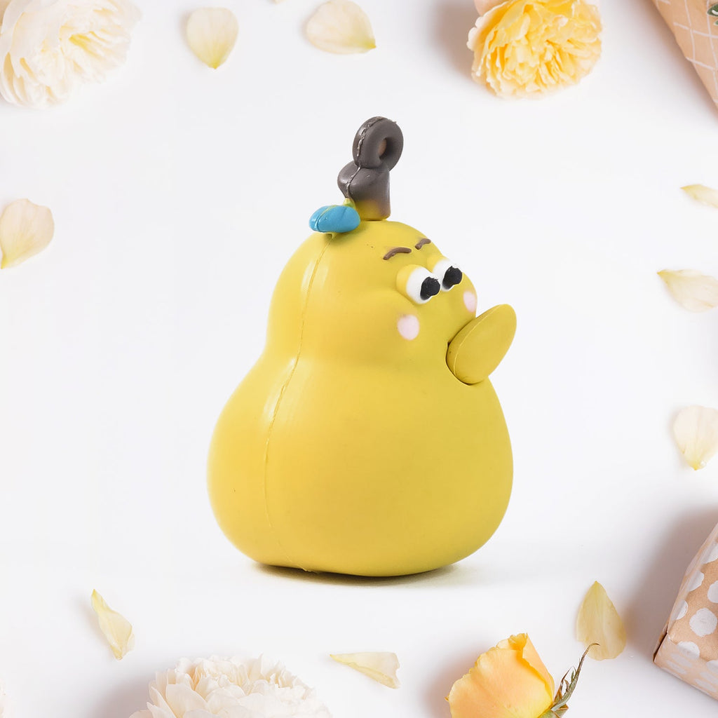 Close-up view of Cute Cartoon Couple keychain pair in soft rubber