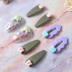 Decorative girls hair clips included in the kids hair styling set