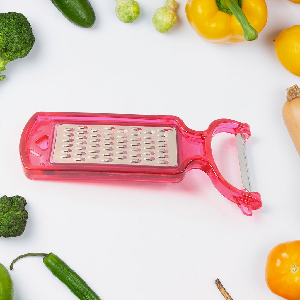 Grating cheese smoothly using the 2-in-1 kitchen peeler and grater tool