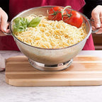 Top view of stainless steel mesh colander showing large capacity with handles