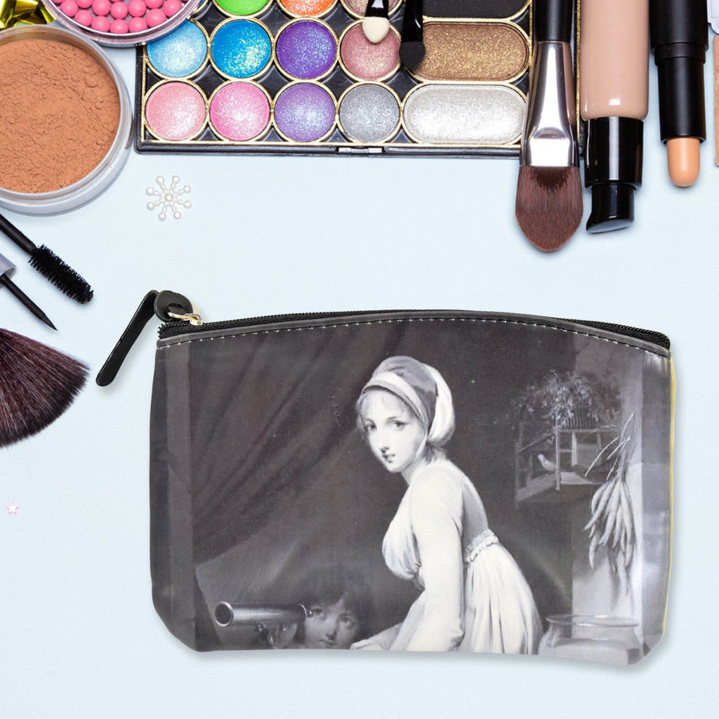 Organivo Portable Storage Bag holding small items like pens and cards.