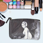 Organivo Portable Storage Bag holding small items like pens and cards.