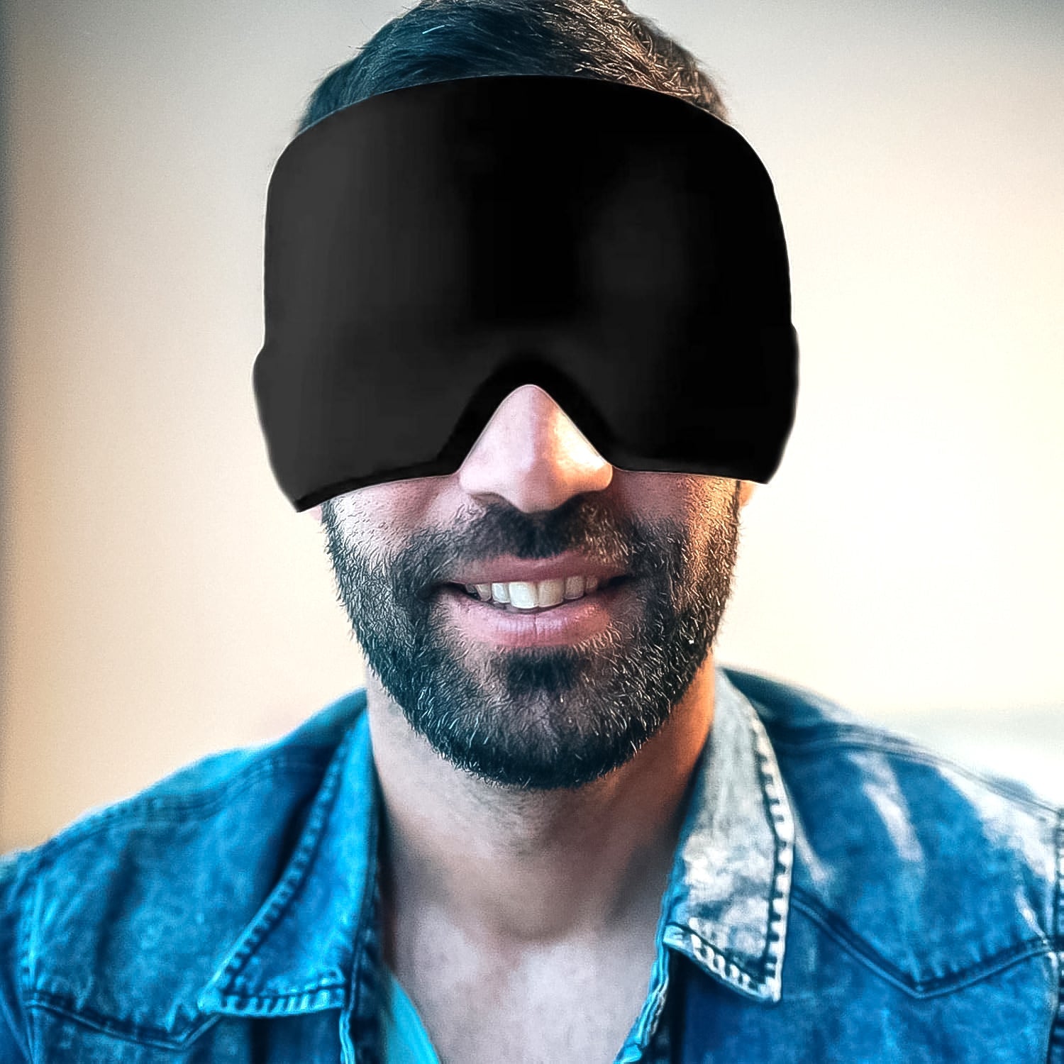 Side view of the grey Migraine Relief Cap on a person, highlighting its full head coverage for effective cooling.