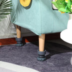 Four anti-vibration pads installed under a washing machine, demonstrating floor protection and elevated stance.