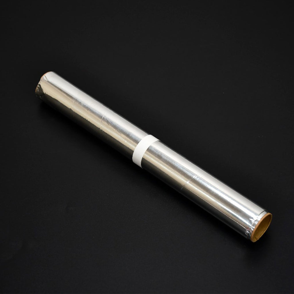 Heavy duty non-stick aluminum foil roll for baking and grilling.