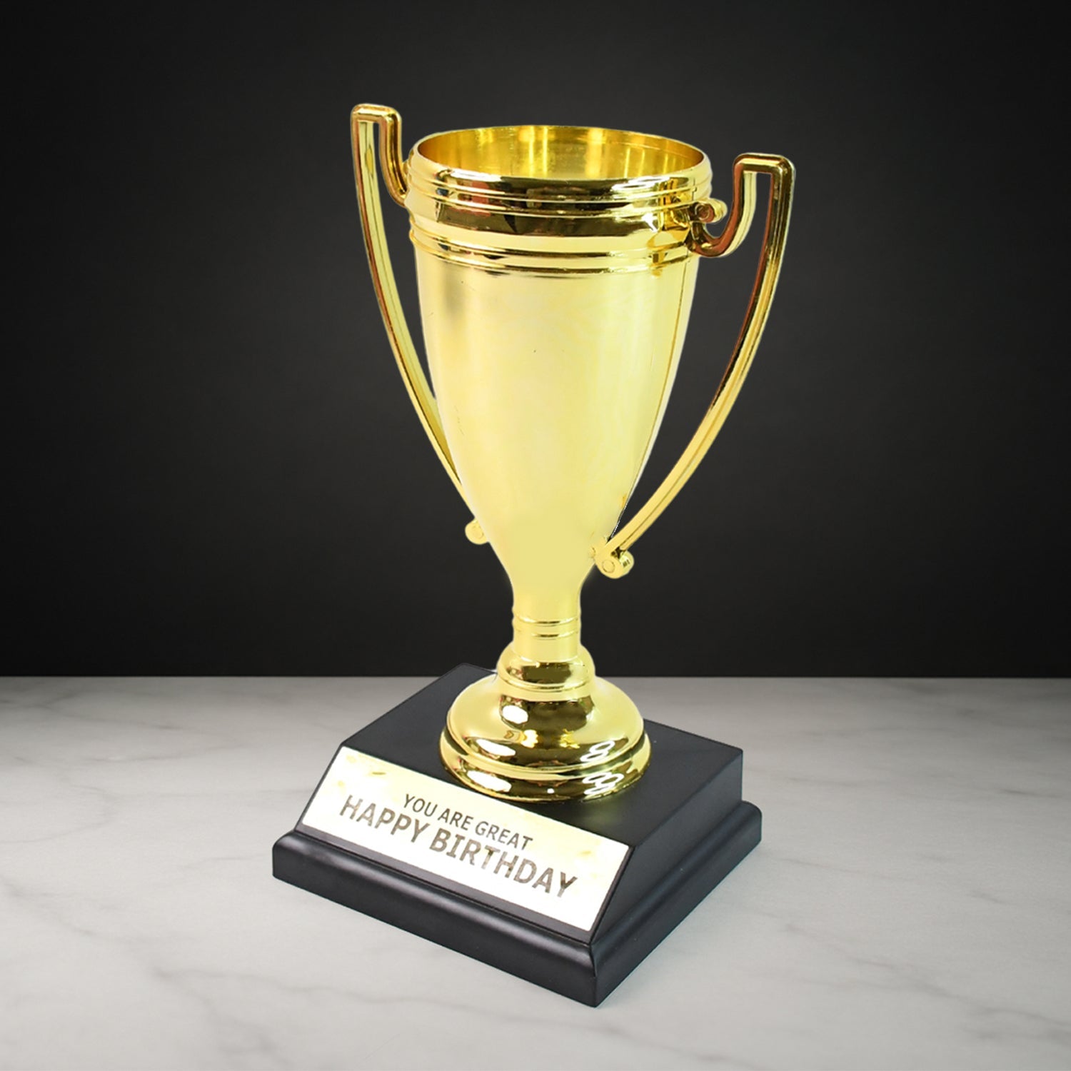 Golden plastic birthday trophy with 'You Are Great - Happy Birthday' text