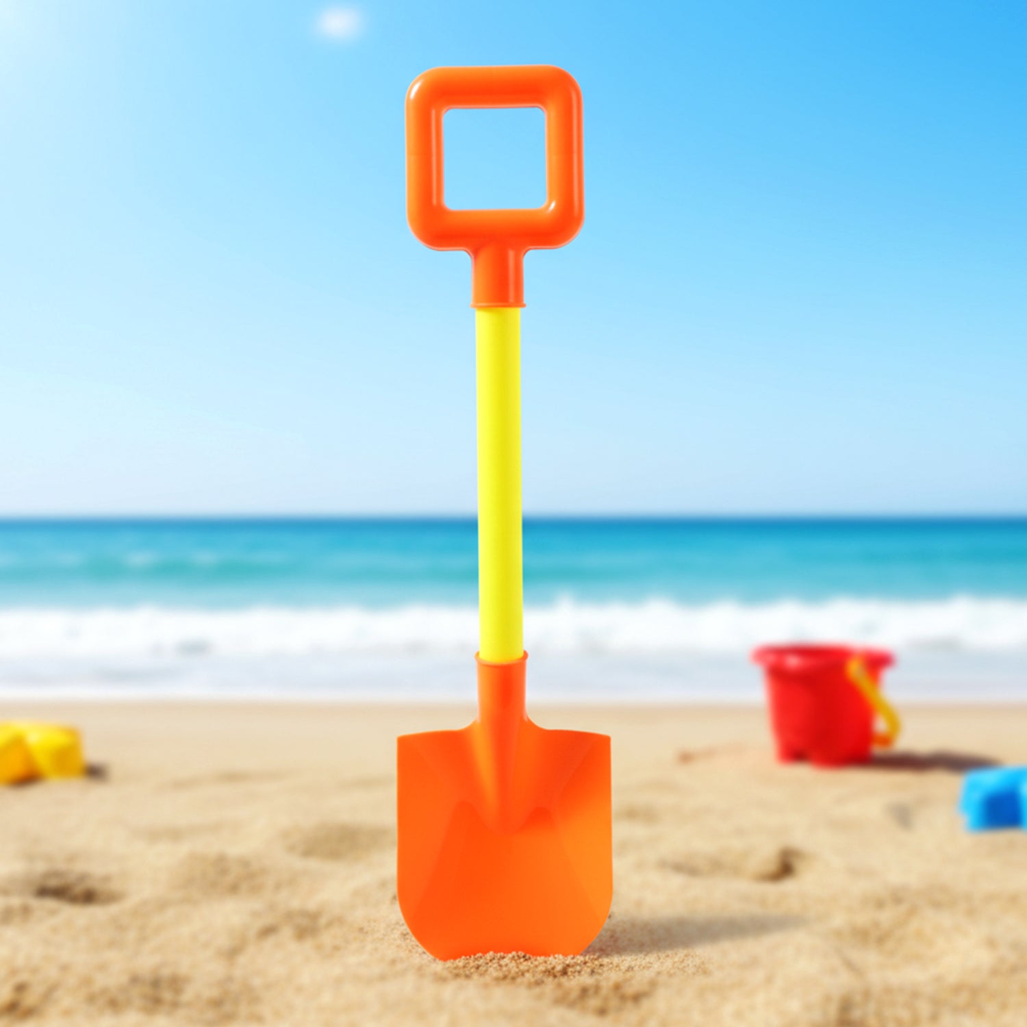 Angled view of kids shovel toy showing ergonomic grip and wide scoop