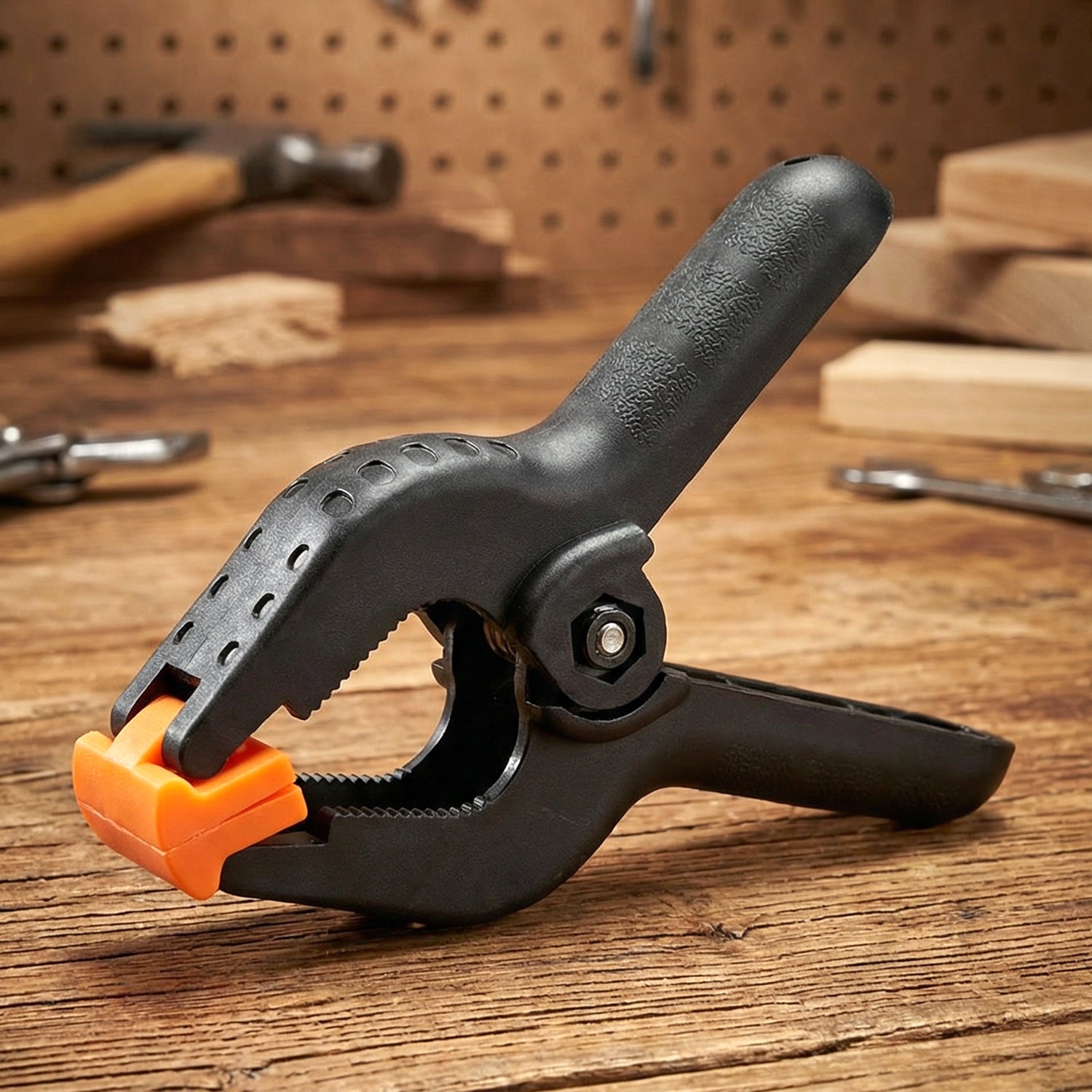 Woodworking spring clamp securing wooden boards for craft projects