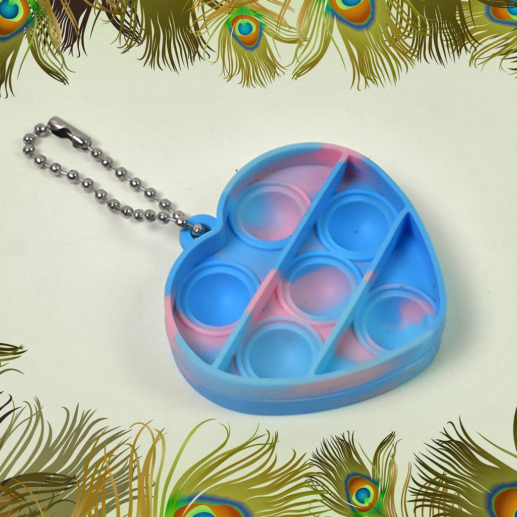 Collection of diverse mini fidget keychains in various shapes and colors, ready for everyday use.