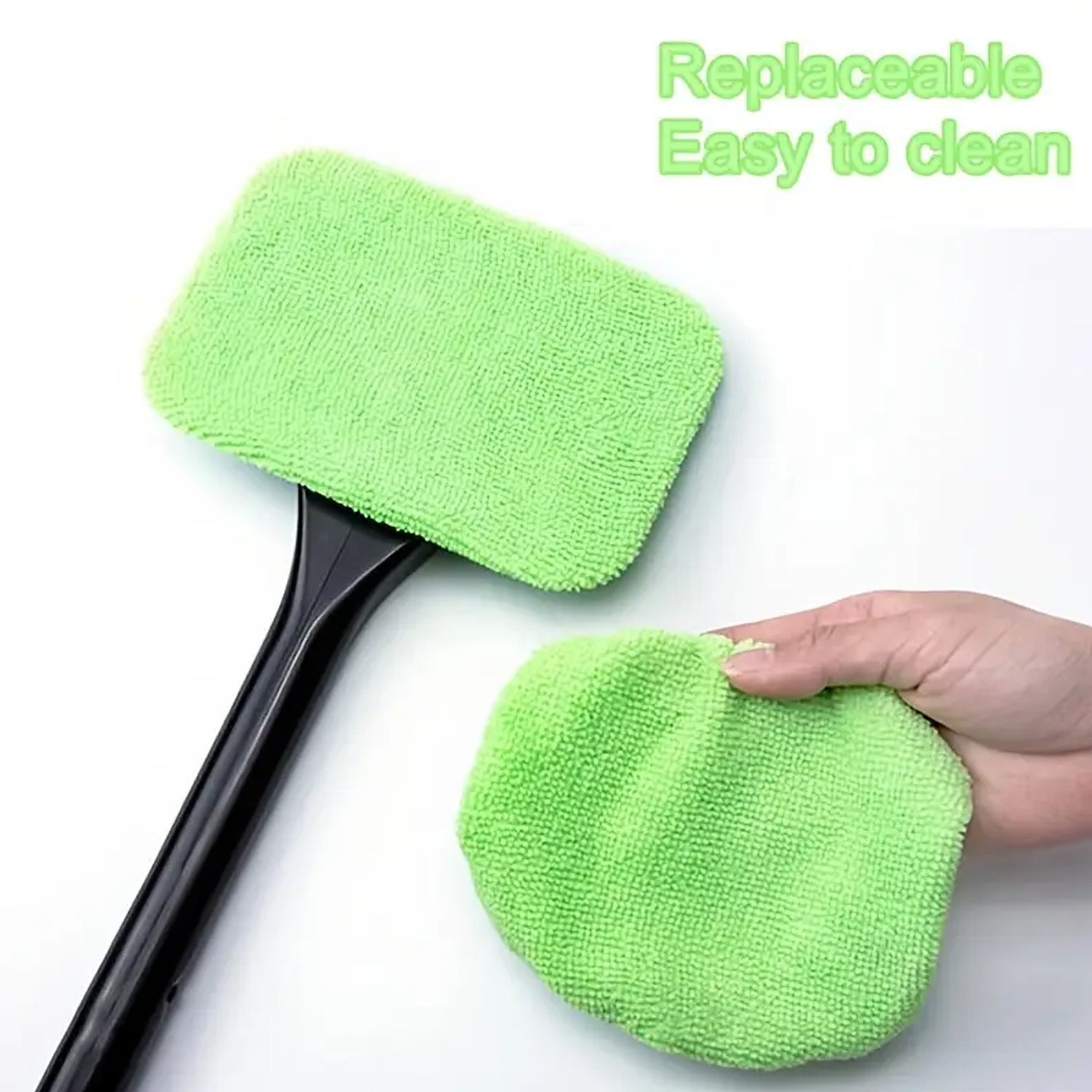 Car windshield cleaner wiper being used inside a car to clean the front window.