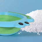 The foldable baby wash basin shown from an angle, highlighting its depth when open.