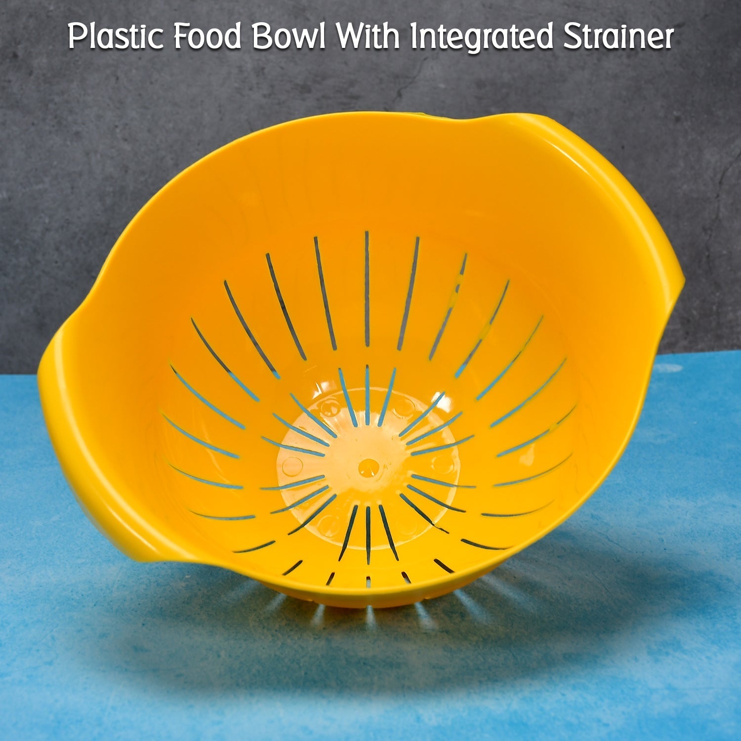 Detailed shot of the integrated strainer feature in the plastic rice washing bowl.