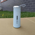 Clear borosilicate glass water bottle 300ml with a black lid, ideal for outdoor sports.