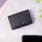 Multi-slot card wallet with secure snap button closure for safe storage