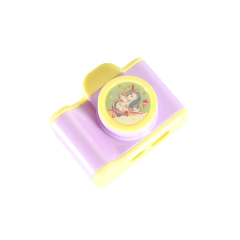 Multiple camera shaped pencil sharpeners in vibrant colours displayed together.