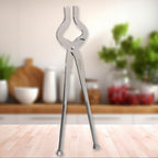 Side view of heavy-duty stainless steel kitchen pincer with ergonomic handle